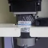 Полуавтоматическая стрейпинг-машина (закрытый стол) KZB-10H Hualian Machinery фото