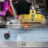 Горизонтальная упаковочная машина DXDZ-250XD (3 servo, лент. 150 мм, рег.форм., min bag L 65, H 40, 2-х позиц.нож) Hualian Machinery фото