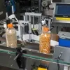 Напольный автоматический этикетировщик для круглой тары с датером HLMT-200D Hualian Machinery фото